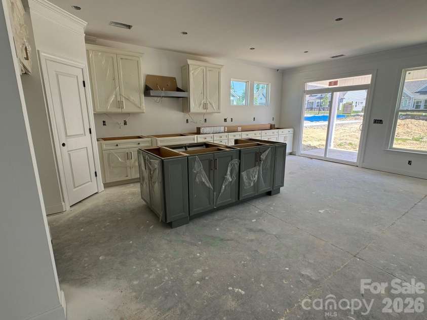 2046 Mantle Ridge Drive, Indian Trail, NC 28079.  MLS# CAR4378821, YatesRealty ID 25102. Construction progress of homesite 203