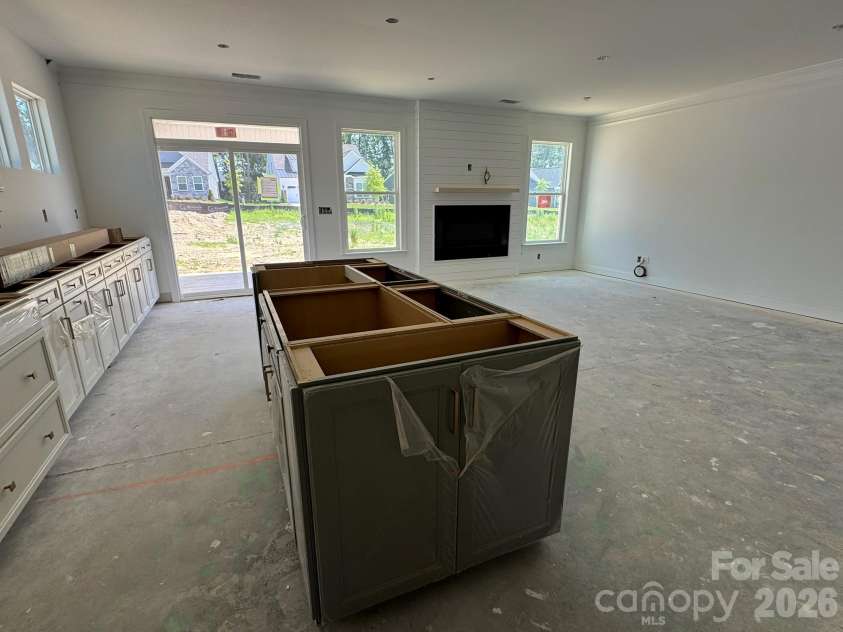 2046 Mantle Ridge Drive, Indian Trail, NC 28079.  MLS# CAR4378821, YatesRealty ID 25102. Construction progress of homesite 203
