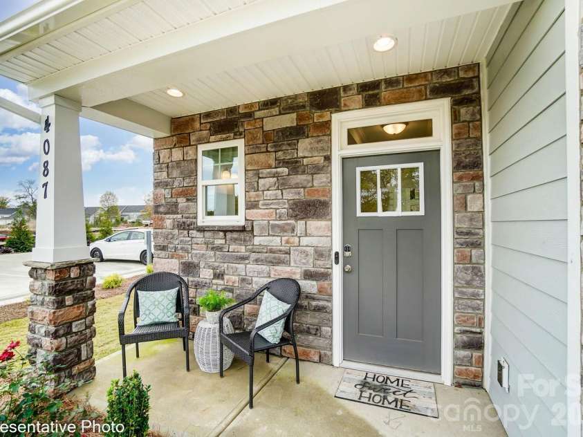 4376 Black Court, Harrisburg, NC 28075.  MLS# CAR4372499, YatesRealty ID 25104. Homesite 218 features an end-unit Cary N floorplan