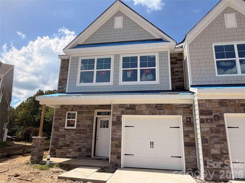 4376 Black Court, Harrisburg, NC 28075.  MLS# CAR4372499, YatesRealty ID 25104. Homesite 218 features an end-unit Cary N floorplan