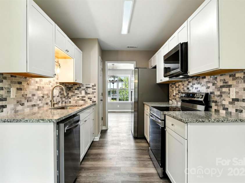 156 Autumn Woods Boulevard, Mount Holly, NC 28120.  MLS# CAR4276951, YatesRealty ID 25107. 