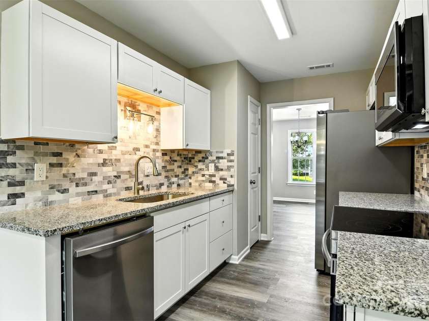 156 Autumn Woods Boulevard, Mount Holly, NC 28120.  MLS# CAR4276951, YatesRealty ID 25107. 