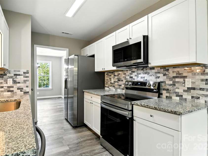 156 Autumn Woods Boulevard, Mount Holly, NC 28120.  MLS# CAR4276951, YatesRealty ID 25107. 