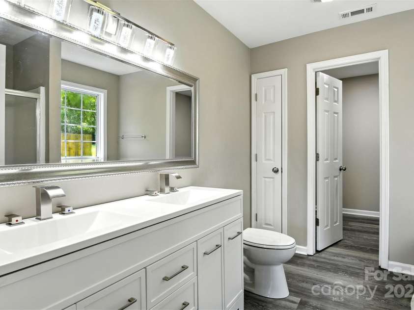 156 Autumn Woods Boulevard, Mount Holly, NC 28120.  MLS# CAR4276951, YatesRealty ID 25107. 