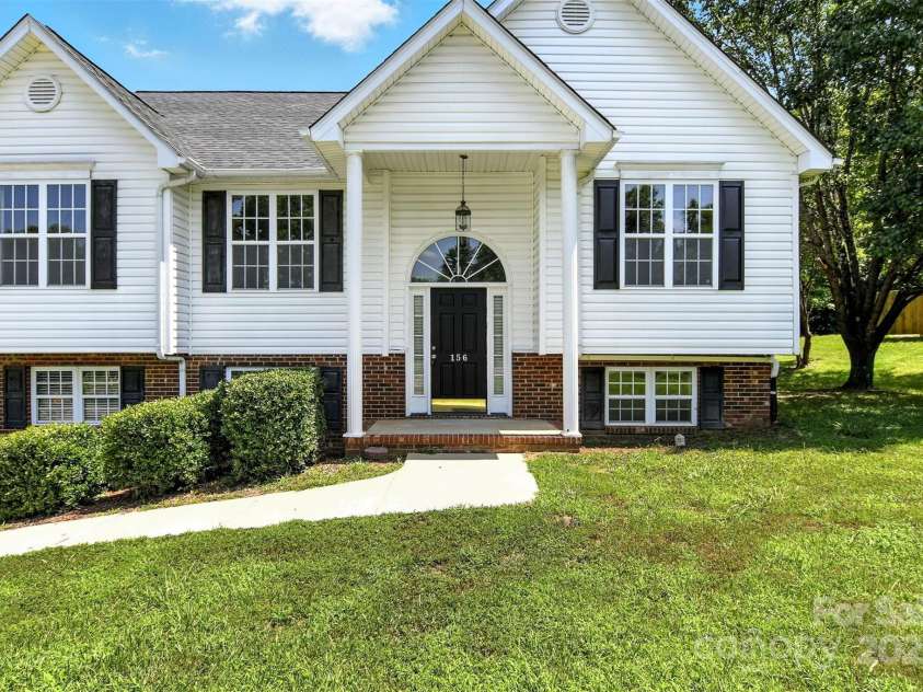 156 Autumn Woods Boulevard, Mount Holly, NC 28120.  MLS# CAR4276951, YatesRealty ID 25107. 