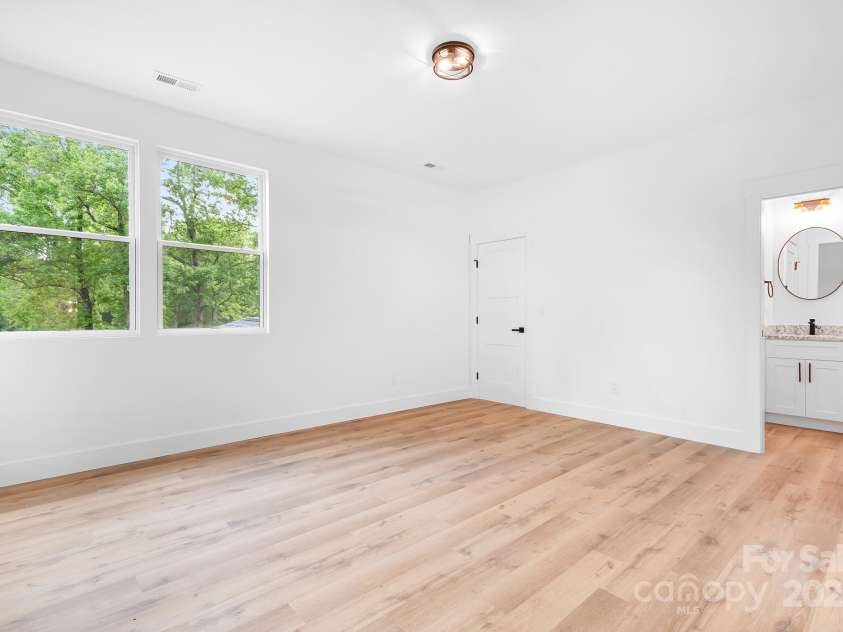 104 Arbor Drive, Waxhaw, NC 28173.  MLS# CAR4258251, YatesRealty ID 25109. Part two of the Jack and Jill layout! This sunny bedroom shares a bath but still offers its own quiet retreat and plenty of space to spread out.