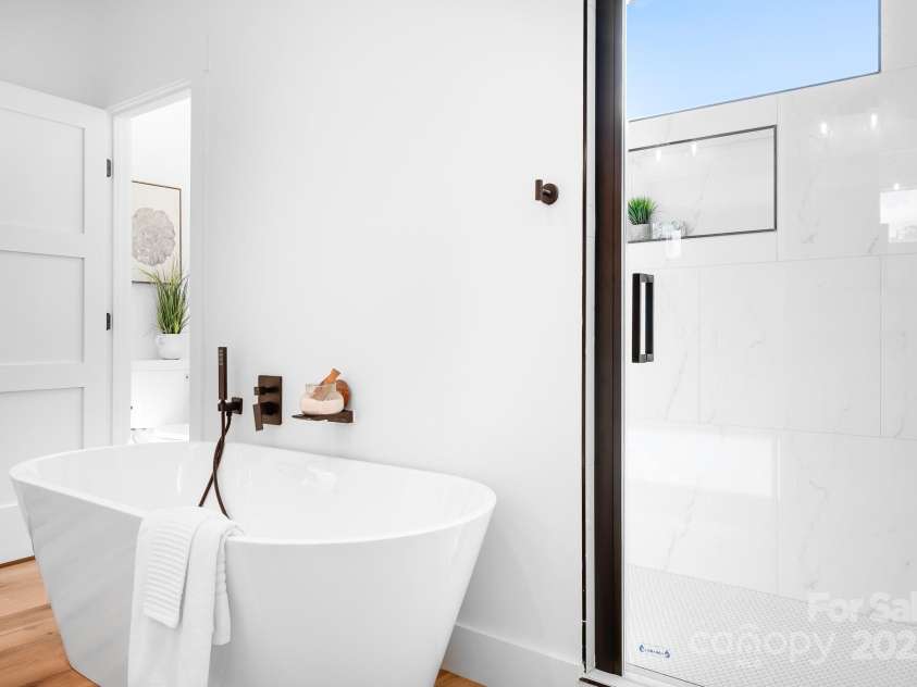 104 Arbor Drive, Waxhaw, NC 28173.  MLS# CAR4258251, YatesRealty ID 25109. Your bubble bath just found its perfect backdrop. Clean lines, calming tones, and total tranquility.