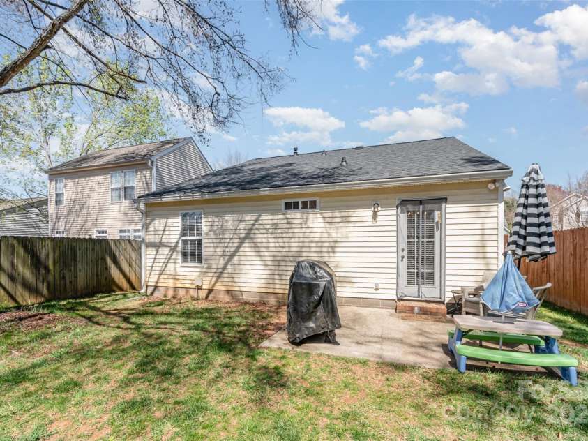 5120 Silabert Avenue, Charlotte, NC 28205.  MLS# CAR4223242, YatesRealty ID 2511. Back patio