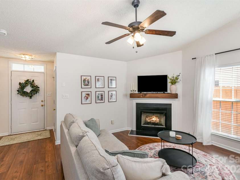 5120 Silabert Avenue, Charlotte, NC 28205.  MLS# CAR4223242, YatesRealty ID 2511. Remodeled mantle area above the gas logs