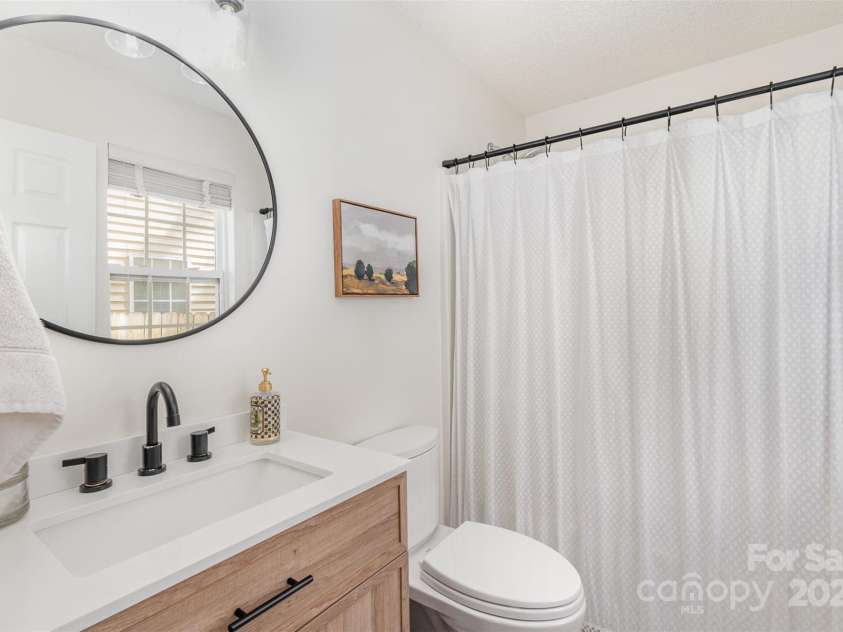 5120 Silabert Avenue, Charlotte, NC 28205.  MLS# CAR4223242, YatesRealty ID 2511. Updated primary ensuite bathroom