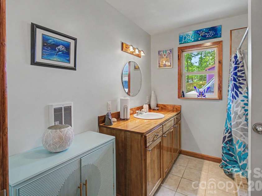 288 Rebel Drive, Hot Springs, NC 28743.  MLS# CAR4377828, YatesRealty ID 25110. Spacious and Updated Bathroom 