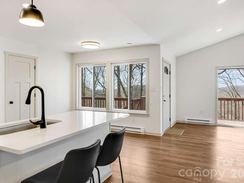 1065 Oak Ridge Lane, Mars Hill, NC 28754.  MLS# CAR4358606, YatesRealty ID 25115. Breakfast Bar Main Level Kitchen