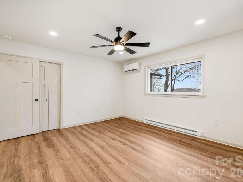 1065 Oak Ridge Lane, Mars Hill, NC 28754.  MLS# CAR4358606, YatesRealty ID 25115. Main Level Guest Bedroom