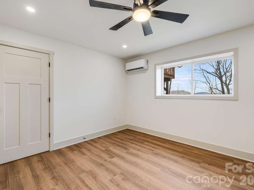 1065 Oak Ridge Lane, Mars Hill, NC 28754.  MLS# CAR4358606, YatesRealty ID 25115. Main Level Guest Bedroom