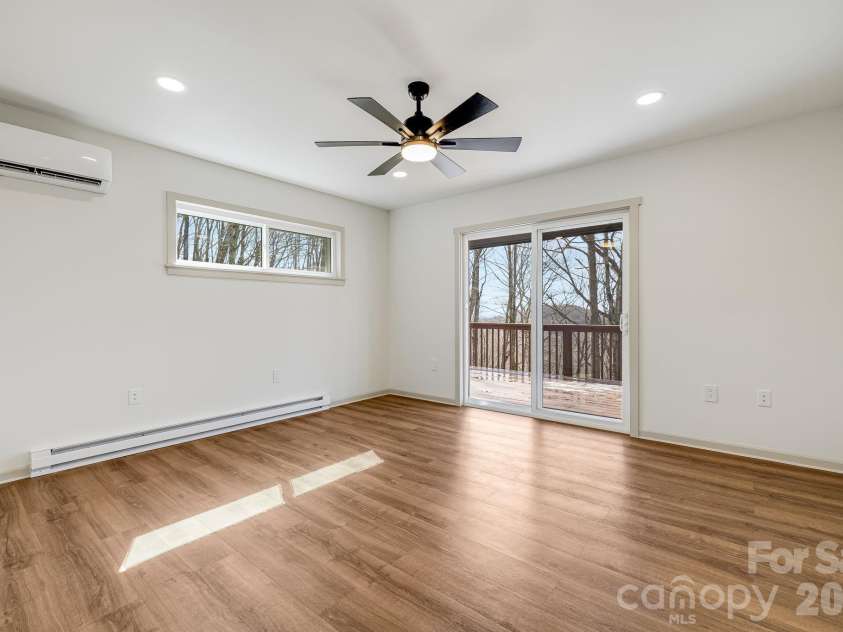 1065 Oak Ridge Lane, Mars Hill, NC 28754.  MLS# CAR4358606, YatesRealty ID 25115. Primary Bedroom w/Deck Access