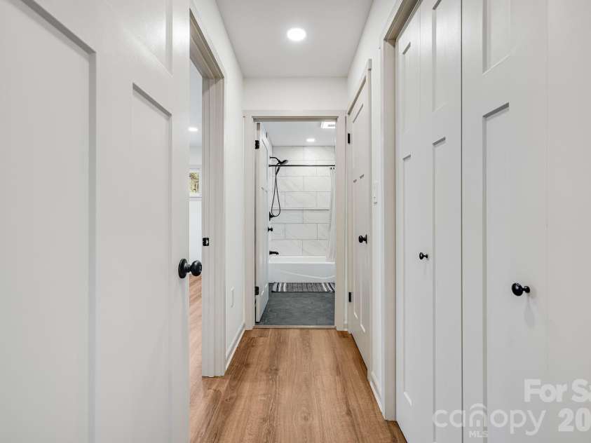 1065 Oak Ridge Lane, Mars Hill, NC 28754.  MLS# CAR4358606, YatesRealty ID 25115. View Toward Guest Full Bathroom Main Level