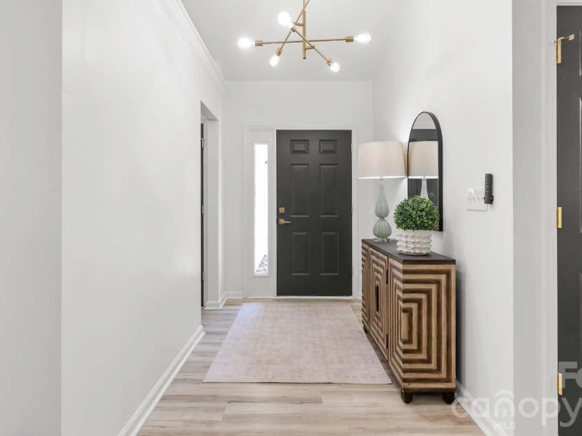8815 Burnt Umber Drive, Charlotte, NC 28215.  MLS# CAR4384212, YatesRealty ID 25126. Desirable Inviting Entry Foyer with Vaulted Ceilings