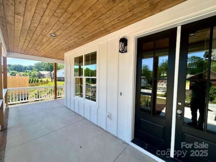 141 Maplewood Court, Hudson, NC 28638.  MLS# CAR4279245, YatesRealty ID 25127. Front wrap around porch area, with tongue and groove spruce ceiling