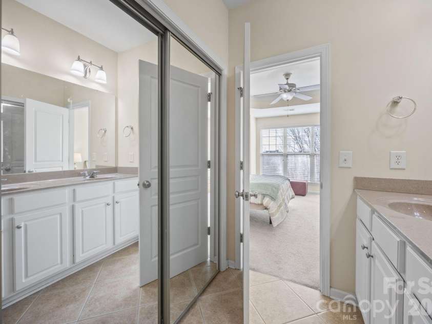 11156 Green Spring Drive, Huntersville, NC 28078.  MLS# CAR4353503, YatesRealty ID 25135. Primary Bedroom Closet located in Primary Bathroom (Doors closed)