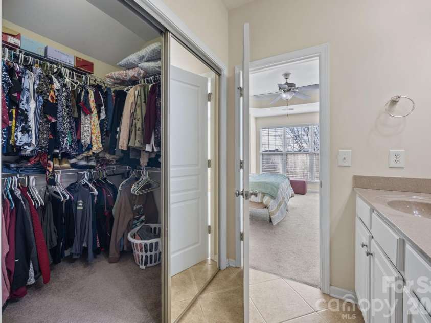 11156 Green Spring Drive, Huntersville, NC 28078.  MLS# CAR4353503, YatesRealty ID 25135. Primary Bedroom Closet located in Primary Bathroom (Doors open)