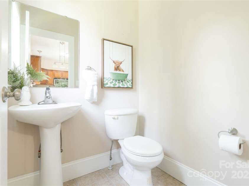 20 Cross Place, Asheville, NC 28801.  MLS# CAR4279844, YatesRealty ID 25137. Half bath on main level