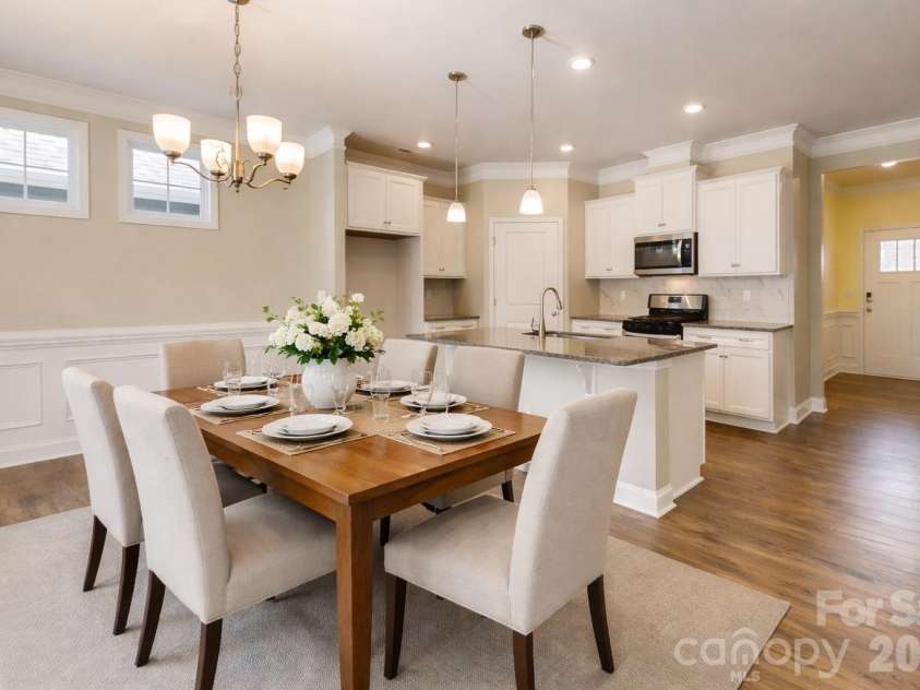 797 Latrobe Drive, Iron Station, NC 28080.  MLS# CAR4310053, YatesRealty ID 2516. Dining room virtually staged