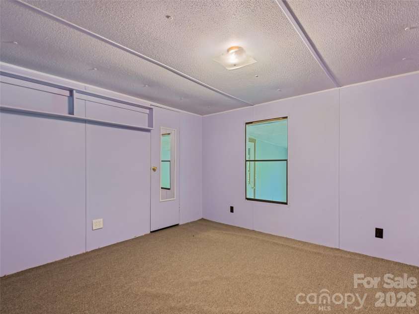 102 Serenity Lane, Clyde, NC 28721.  MLS# CAR4384211, YatesRealty ID 25163. 2nd Bedroom