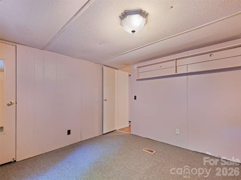 102 Serenity Lane, Clyde, NC 28721.  MLS# CAR4384211, YatesRealty ID 25163. Bonus Room
