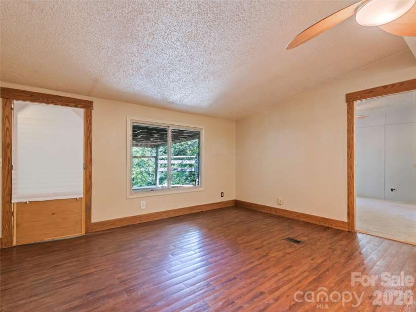 102 Serenity Lane, Clyde, NC 28721.  MLS# CAR4384211, YatesRealty ID 25163. Living Room