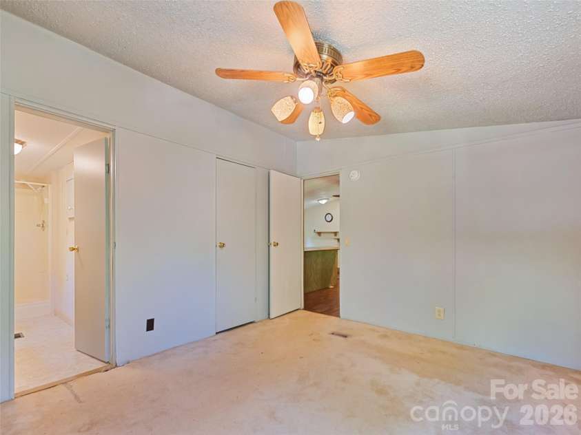 102 Serenity Lane, Clyde, NC 28721.  MLS# CAR4384211, YatesRealty ID 25163. Primary Bedroom