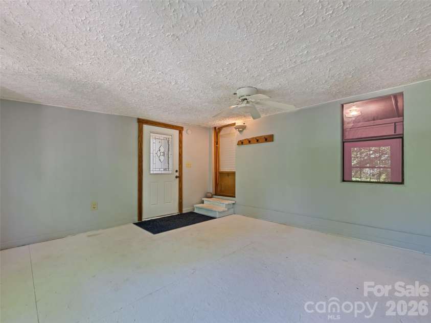 102 Serenity Lane, Clyde, NC 28721.  MLS# CAR4384211, YatesRealty ID 25163. Sunroom