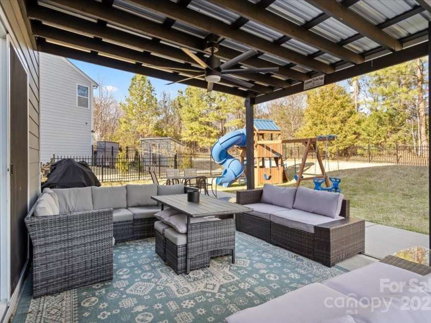 5703 Eleanor Rigby Road, Charlotte, NC 28278.  MLS# CAR4232389, YatesRealty ID 2517. Amazing backyard with pergola
