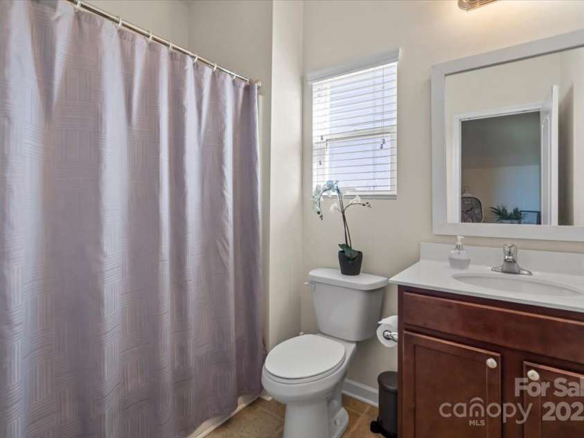 5703 Eleanor Rigby Road, Charlotte, NC 28278.  MLS# CAR4232389, YatesRealty ID 2517. Full bath downstairs