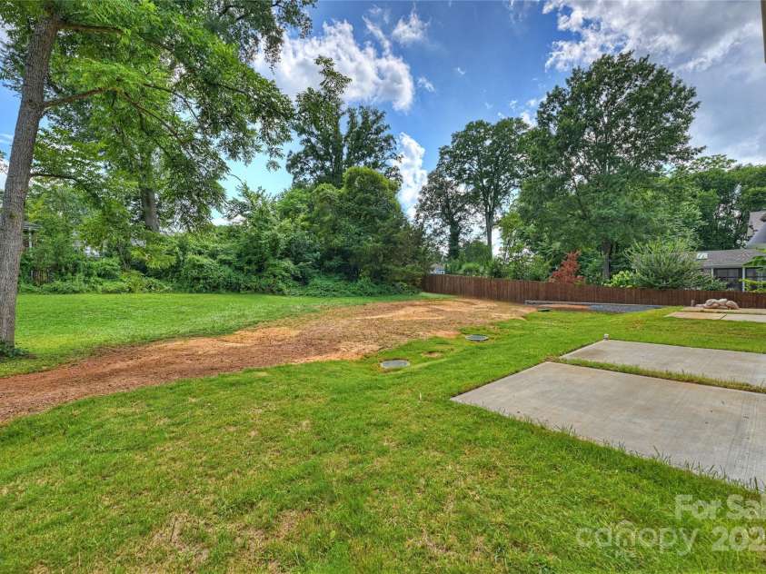 209 Coxe Avenue, Charlotte, NC 28208.  MLS# CAR4317476, YatesRealty ID 25172. Great backyard