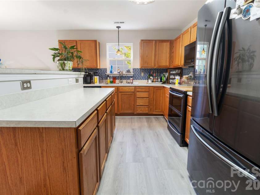317 Ashton Bluff Circle, Mount Holly, NC 28120.  MLS# CAR4353434, YatesRealty ID 25172. 