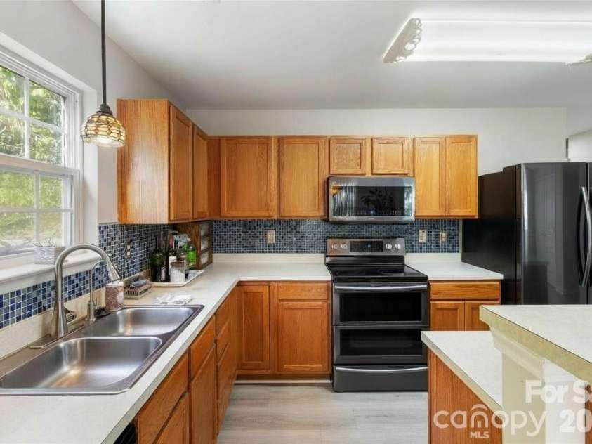 317 Ashton Bluff Circle, Mount Holly, NC 28120.  MLS# CAR4353434, YatesRealty ID 25172. 