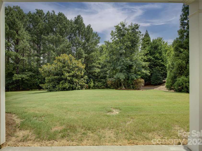 4004 Twiddy Street, Fort Mill, SC 29707.  MLS# CAR4279197, YatesRealty ID 25176. View of the backyard.