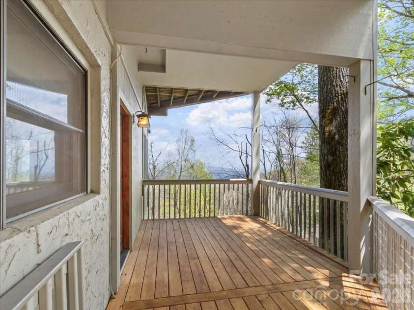 49 Slickrock Ridge Way, Burnsville, NC 28714.  MLS# CAR4367218, YatesRealty ID 25177. Covered deck
