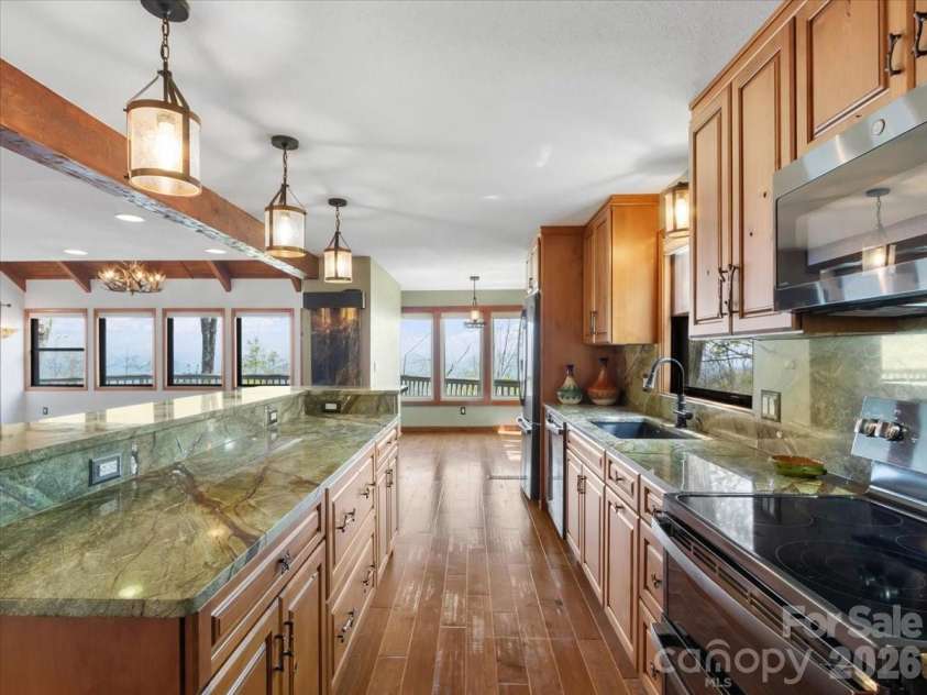 49 Slickrock Ridge Way, Burnsville, NC 28714.  MLS# CAR4367218, YatesRealty ID 25177. Kitchen with imported Marble countertops