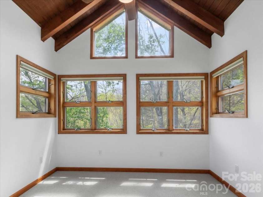 49 Slickrock Ridge Way, Burnsville, NC 28714.  MLS# CAR4367218, YatesRealty ID 25177. Windows galore!
