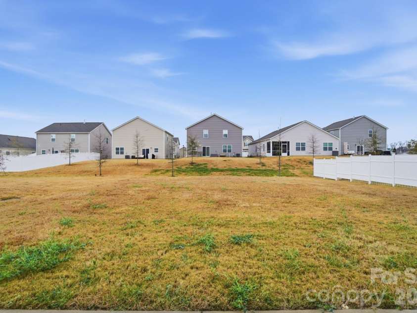 7576 Stonehouse Drive, Gastonia, NC 28056.  MLS# CAR4328250, YatesRealty ID 25180. Backyard