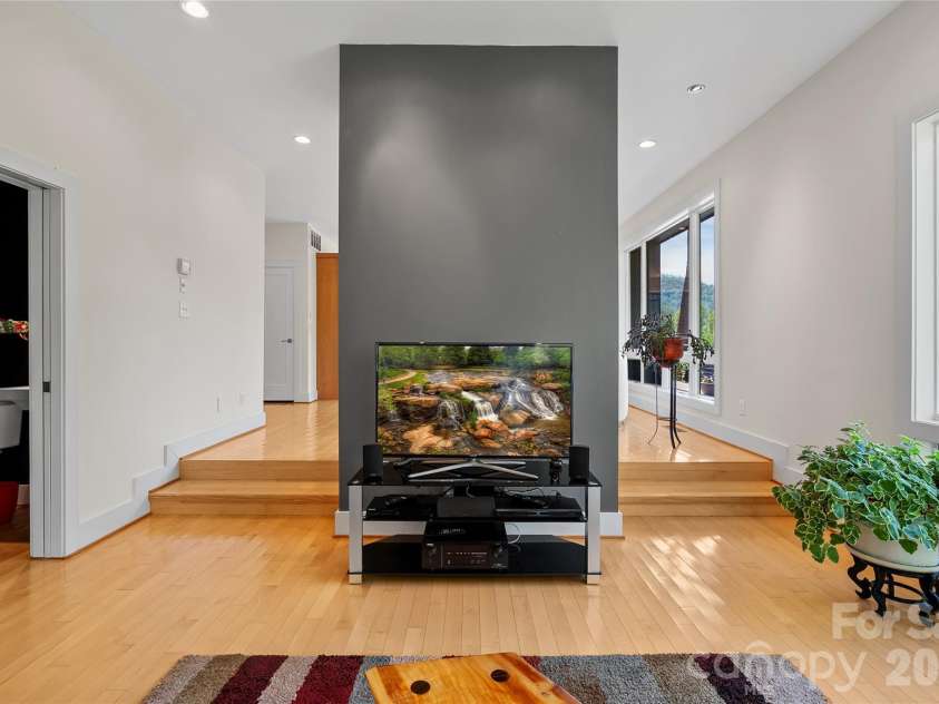 404 Amanda Drive, Mars Hill, NC 28754.  MLS# CAR4374158, YatesRealty ID 25181. Bonus Space TV Room Off Living Room