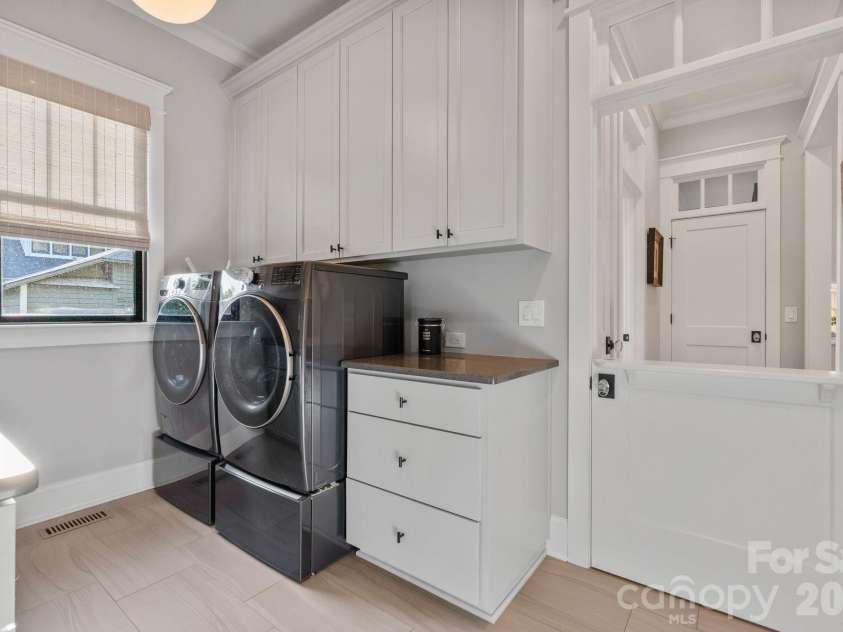 351 Delburg Street, Davidson, NC 28036.  MLS# CAR4375169, YatesRealty ID 25182. Laundry Room