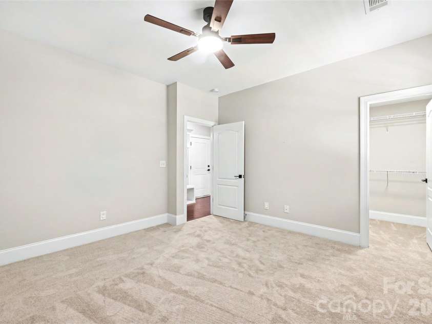 4624 Pebble Run Drive, Matthews, NC 28105.  MLS# CAR4383386, YatesRealty ID 25185. Bedroom on Main Floor