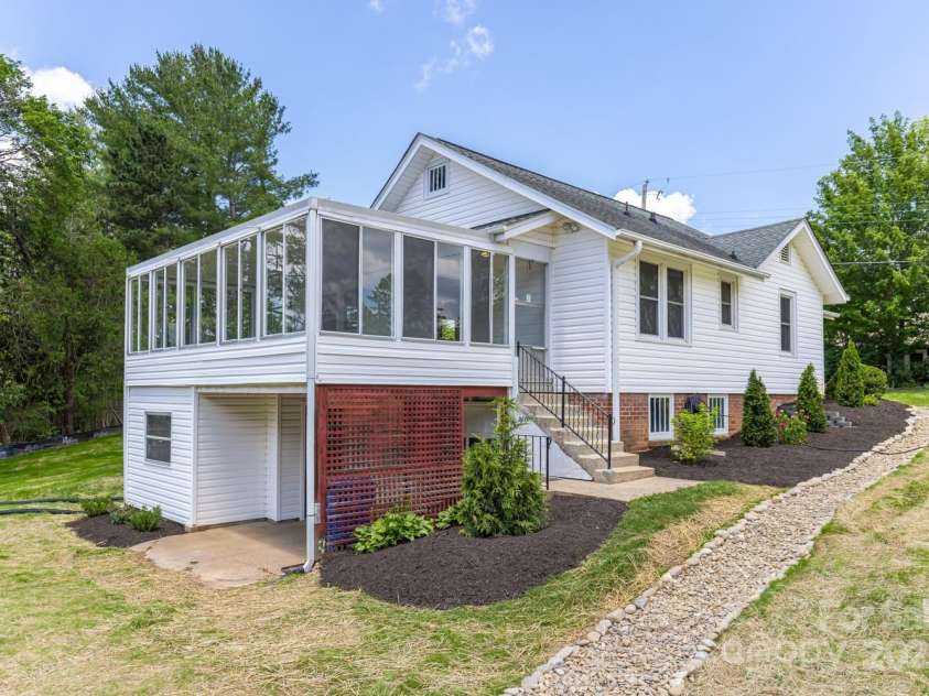 438 Hazel Mill Road, Asheville, NC 28806.  MLS# CAR4269858, YatesRealty ID 25189. Covered Back Patio, Entrance to Lower Level