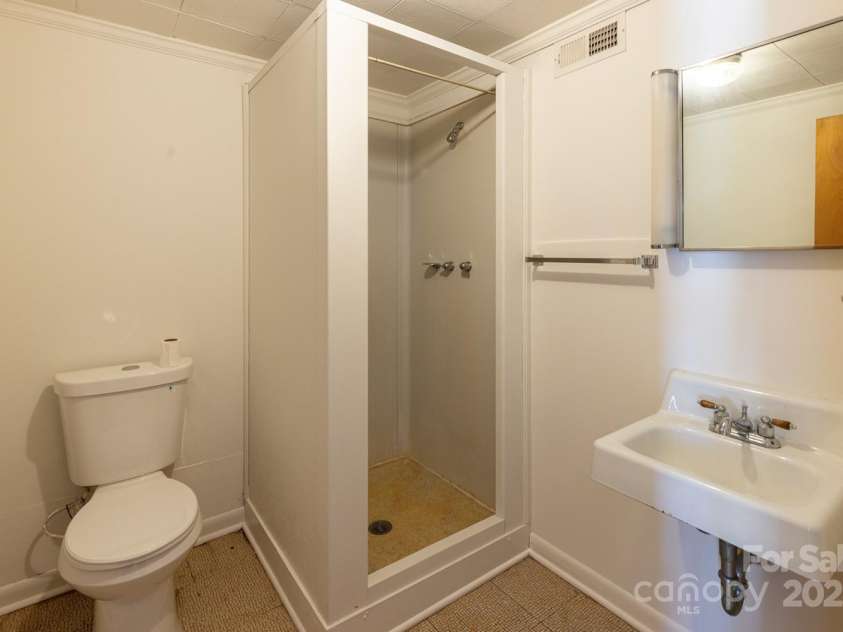 438 Hazel Mill Road, Asheville, NC 28806.  MLS# CAR4269858, YatesRealty ID 25189. Full Bathroom - Lower Level