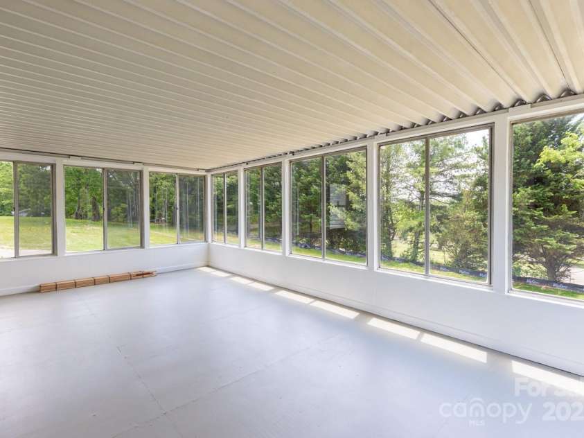 438 Hazel Mill Road, Asheville, NC 28806.  MLS# CAR4269858, YatesRealty ID 25189. Sunroom - Windows on 3 sides