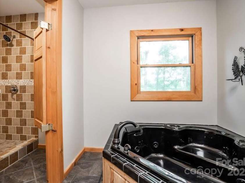 70 Double Back Lane, Mars Hill, NC 28754.  MLS# CAR4304443, YatesRealty ID 2519. Custom Shower