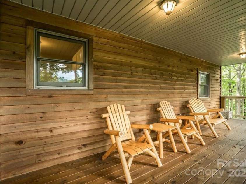 70 Double Back Lane, Mars Hill, NC 28754.  MLS# CAR4304443, YatesRealty ID 2519. Tranquill Covered Deck