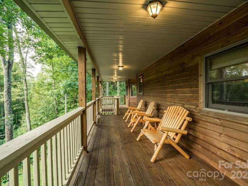 70 Double Back Lane, Mars Hill, NC 28754.  MLS# CAR4304443, YatesRealty ID 2519. Tranquill Covered Deck